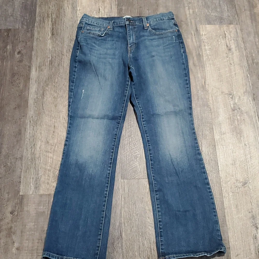 Levi 515 boot cut womens size 12M Blue Jeans Casual Medium Wash Distressed - Picture 1 of 12